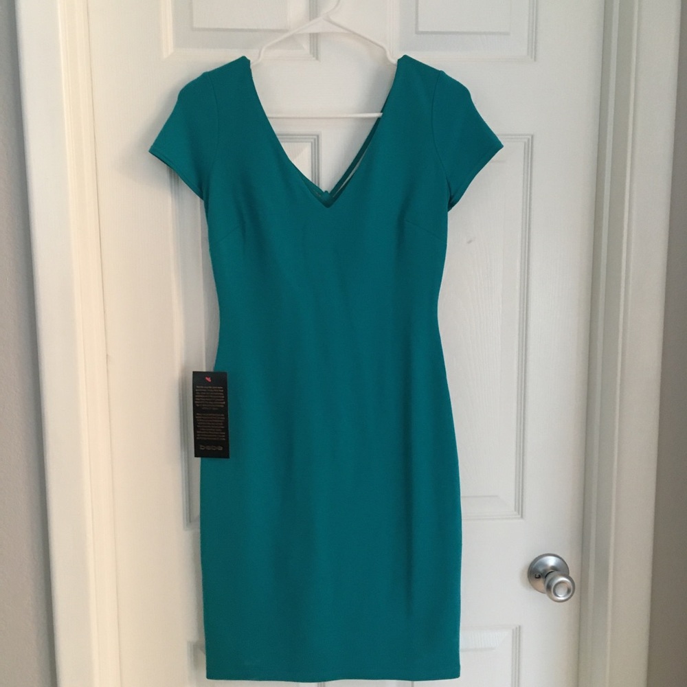 Brand New - Turquoise open back dress